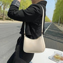 Nina - Sac à main demi-lune